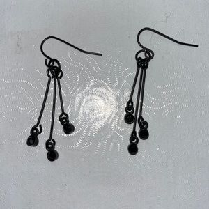 Ladies black dangle earrings